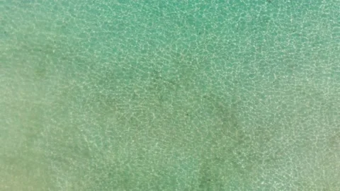 Sun reflection,Light glare in ocean water.Blue transparent water background Stock Footage 134946053