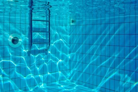 Sun reflections in pool Stock Photos