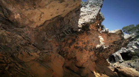 Sun reflections on a rock Stock Footage 7740332