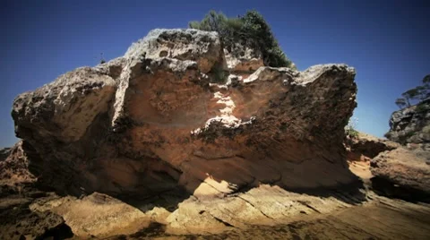 Sun reflections on a rock Stock Footage 7740604