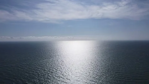 Sun Reflections on Sea Surface – HD Drone Static Shot Stock Footage 319762713
