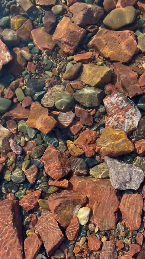 Sun reflections on stones Stock Footage 157779325