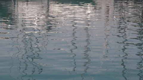 Sun reflections at the water surface Video stock 107379275