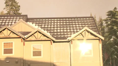Sun Reflects on Snowy Building Stock Footage 36730312