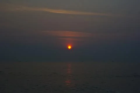 Sun rise on the beach 4 Stock Photos