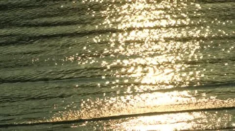 Sun rise ray light over ocean close up Stock Footage 21900229