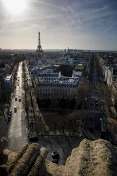The sun rises behind the Eiffel Tower in Paris, France near New Years 스톡 사진