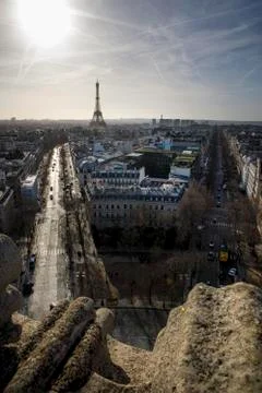 The sun rises behind the Eiffel Tower in Paris, France near New Years 스톡 사진