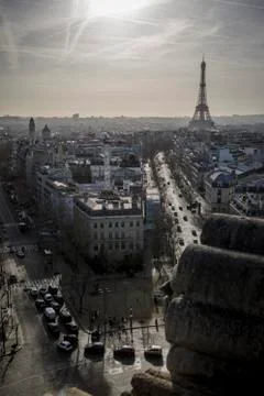 The sun rises behind the Eiffel Tower in Paris, France near New Years 스톡 사진