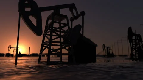 The sun rises behind a large oil field. Infinity loop. 3d rendering Stock Footage 132100012