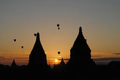 The sun rises between two pagodas, Bagan, Myanmar Stock Photos