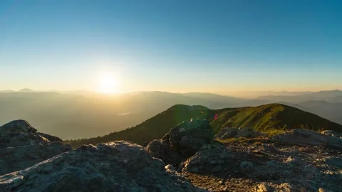 The Sun Rises a Over a Beautiful Mountain Range Stock Footage 149908499