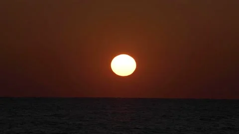 Sun Rises Over Water In Timelapse Stock Footage 130391323