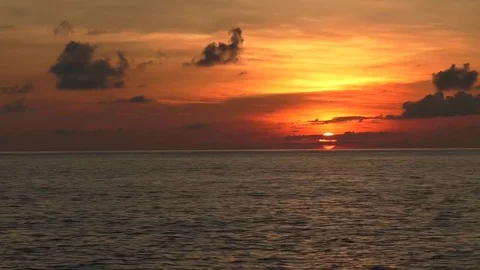 The sun rises from the sea at down Stock Footage 71763353