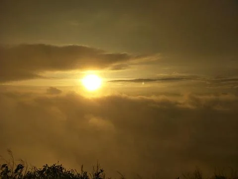 The sun rises in the sky Stock Photos