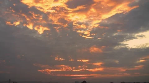 The sun rises through the clouds Stock Footage 48251790