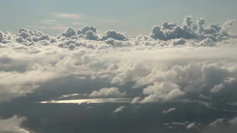 Sun is rising above the endless sea of clouds until the horizon. Stockbeeldmateriaal 282969264