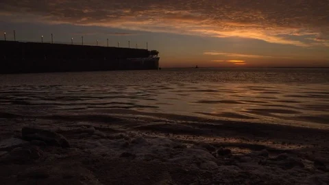 Sun rising and Ore Dock in winter 動画素材 72804259