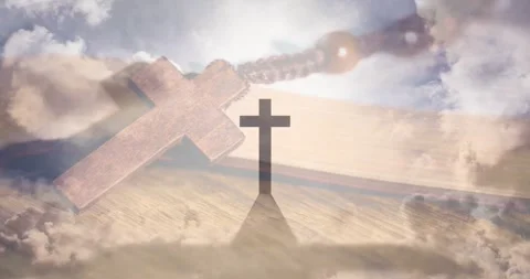 Sun rising behind mid cross starting clouds moving pendant beads fading outline Stock Footage 330192322