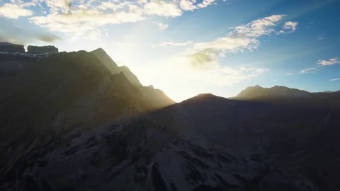 Sun Rising Behind Mountains Stock Footage 117145822