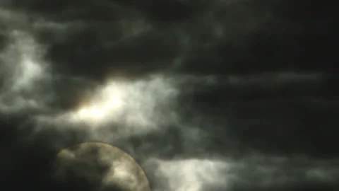Sun rising into darkness of clouds Video stock 122613891
