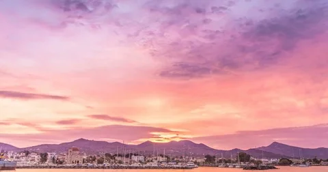 Sun rising in the harbor and mountains Stock Footage 71058352