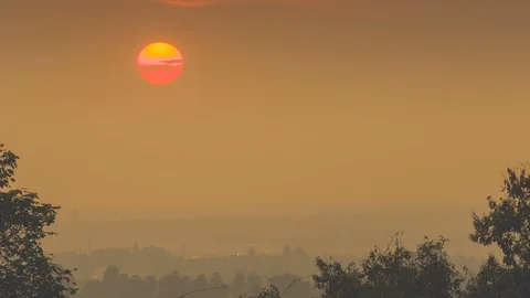 Sun rising from the mist Stock Footage 87815906