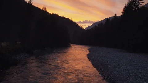 The sun is rising over a calm river Stock Footage 101900309