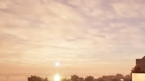 Sun rising over river with light clouds in city around dawn Stock Footage 344280408