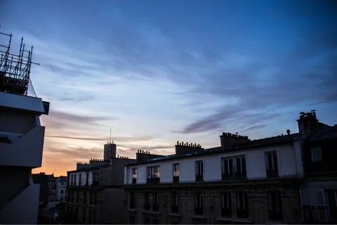 Sun rising over the roofs of Paris Stock Footage 165683402