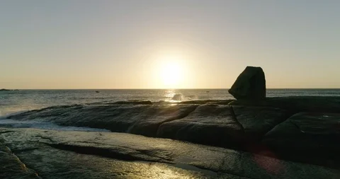 Sun rising over the rugged coastline at Bicheno Tasmania. Stock Footage 88034049