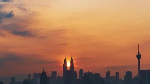 Sun rising scene over iconic Kuala Lumpur buildings or landmarks Stock Footage 117997774