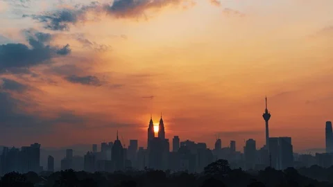 Sun rising scene over iconic Kuala Lumpur buildings or landmarks Stock Footage 117997808