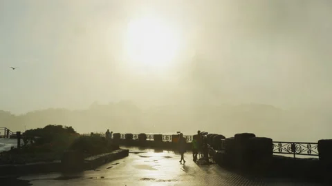 Sun seen through mist at Niagara Falls Stockbeeldmateriaal 218234371