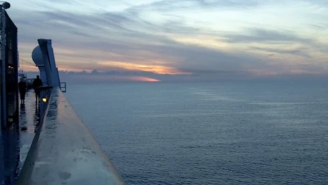 Sun set from the deck of a cruise ship at sea Stock Footage 91840347