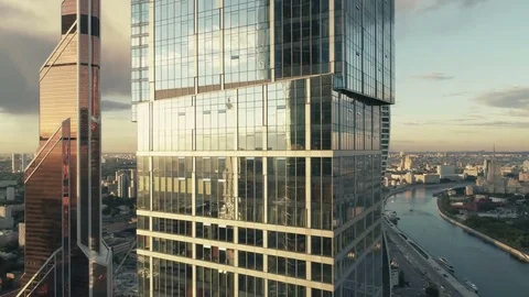A sun set drone Aerial shot of skyscrapers of business centre 스톡 동영상 83493105