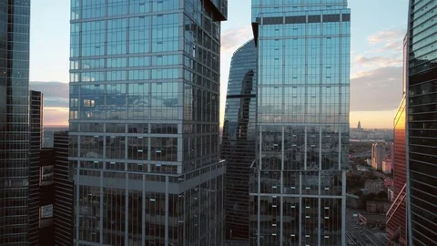 A sun set drone Aerial shot of skyscrapers of business centre Video stock 84065934