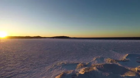 A sun set on Lake Superior in winter Stock Footage 137341477