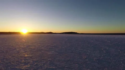 A sun set on Lake Superior in winter Stock Footage 137341628