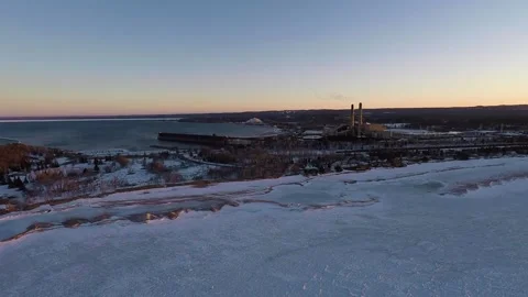 A sun set on Lake Superior in the winter Stock Footage 137342951
