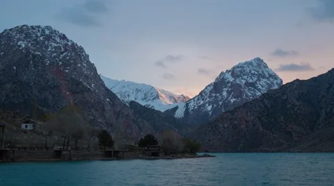 Sun set on the mountain lake Iskander-kul in Tajikistan Stock Footage 62915622