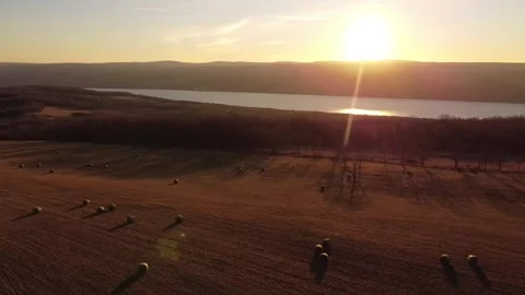 Sun set over hill field Stock Footage 264367572