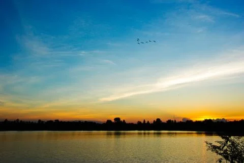 Sun set in the river Stock Photos