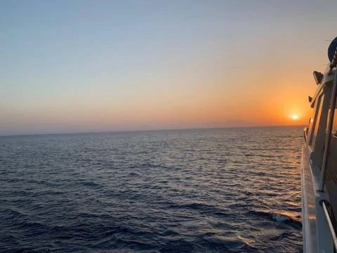 Sun set at sea Stock Photos