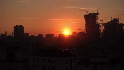 Sun Seting over the city Stock Footage 142086025