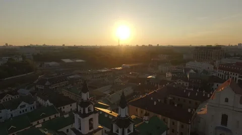 Sun sets above an old european town with castles and church Stock Footage 66436045