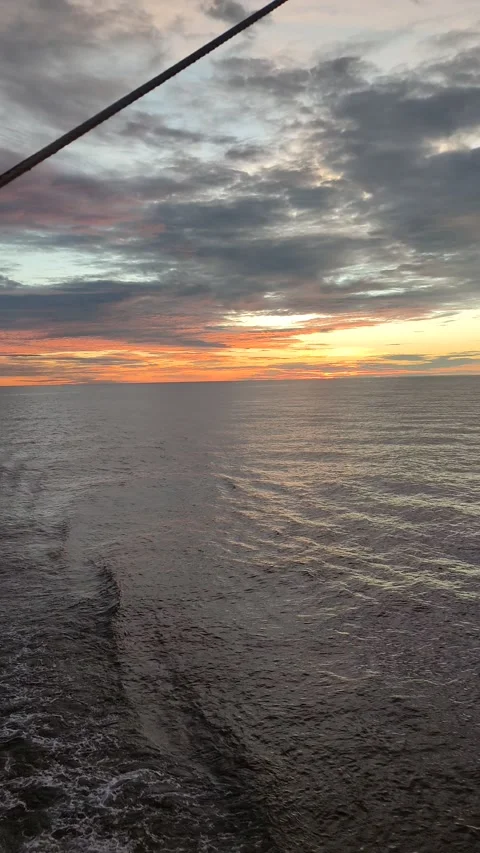 The sun sets above the ship. Stock Footage 311489825