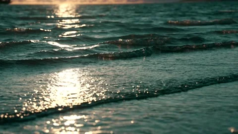 Sun sets above the waves. Stock Footage 200827181