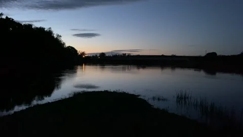 The sun sets along the Missouri River near Great Falls, Montana Stock Footage 146191641