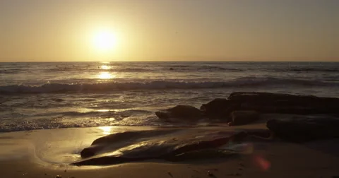 Sun sets on the beach horizon Stock Footage 68550819